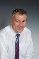 A set of photographs of David Walker, Operations Director for the company MicroEmissive Displays.  3 images taken in September 2007.